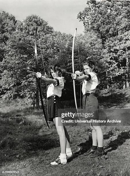 Two Teen Girls Practicing Archery, 1944.