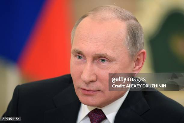 Picture taken on December 7, 2016 shows Russian President Vladimir Putin speaks during an interview with Nippon Television Network Corporation and...
