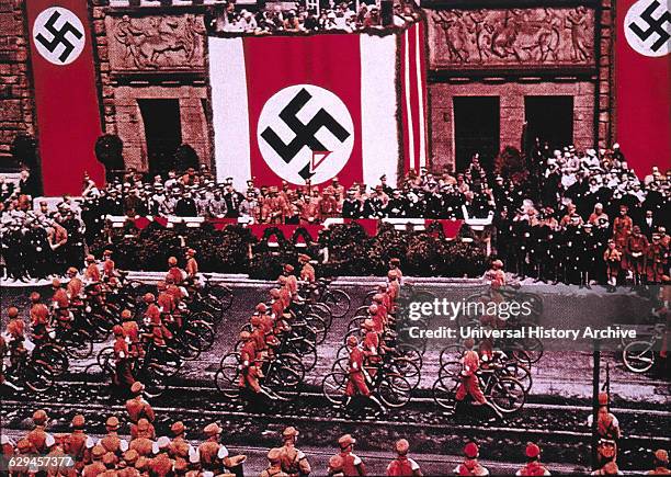 Troops with Bicycles Parading before Adolf Hitler at Rally, Dortmund, Germany, 1933.