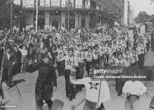 Communist youth march in Madrid during the Spanish Civil War. Dated 1937.