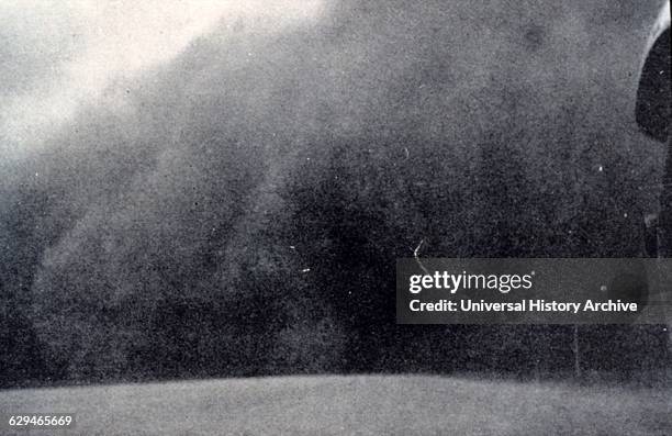 Photograph of an approaching dust storm. Near Watertown, South Dakota. Dated 1934.