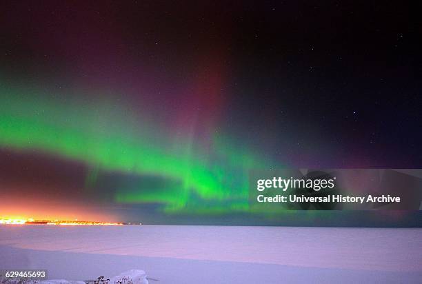 Photograph of the Northern Lights over the frozen Lake Superior, Michigan, Marquette. Photographed by Mark Stacey. Dated 2006.