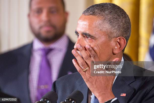 President Barack Obama gets emotional as he speaks on reducing gun violence in the East Room of the White House on January 5, 2016 in Washington, DC.