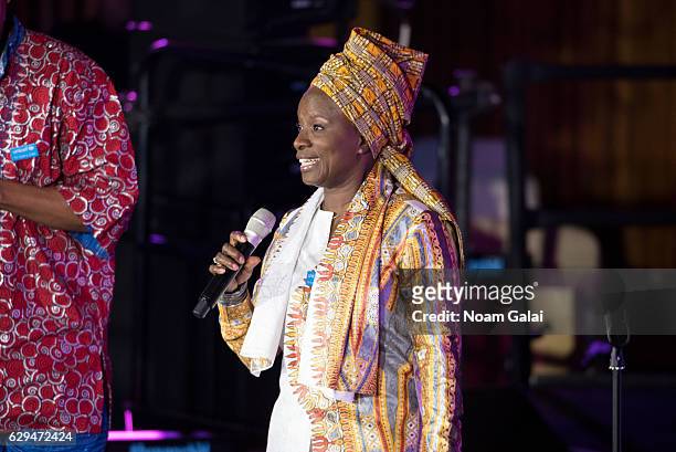 Singer Angelique Kidjo performs at UNICEF's 70th anniversary event at United Nations Headquarters on December 12, 2016 in New York City.
