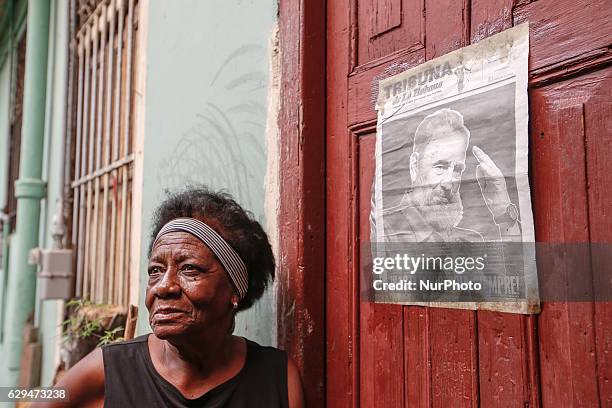 An older lady seen near her appartment entrance in Havana city center. For a week I explored the streets of Havana, the homes and Havana's vastly...