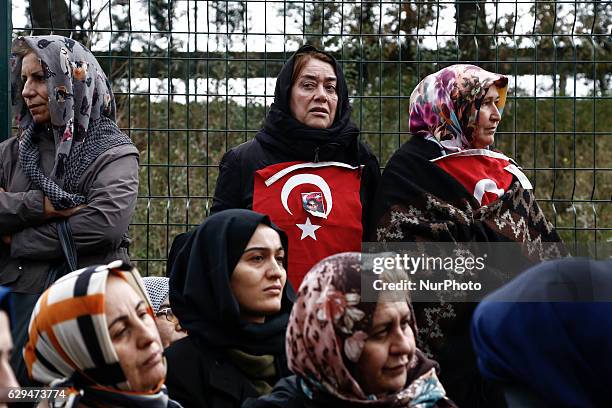 People shout slogans on December 12, 2016 during police chief Kadir Yildirim's funeral, who was killed on December 10 blasts in Istanbul. The death...