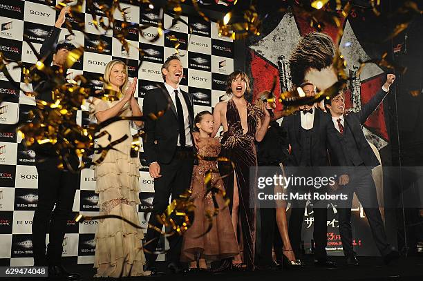 Milla Jovovich speaks on poses on stage with cast at the world premiere of 'Resident Evil: The Final Chapter' at the Roppongi Hills on December 13,...