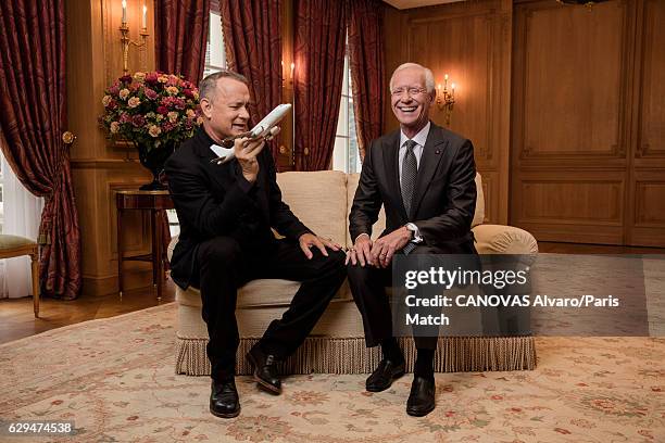 Actor Tom Hanks with retired commercial pilot Chesley Sullenberger are photographed for Paris Match on November 18, 2016 in Paris, France.