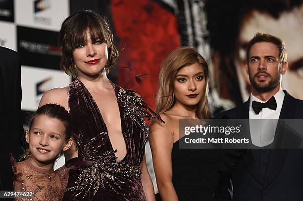 Lee Raviv, Milla Jovovich, Rolaand William Levy attend the world premiere of 'Resident Evil: The Final Chapter' at the Roppongi Hills on December 13,...