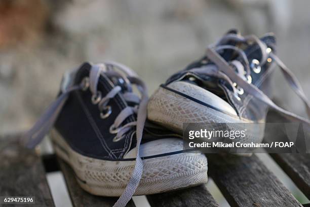 close-up of shoes - untied shoelace stock pictures, royalty-free photos & images