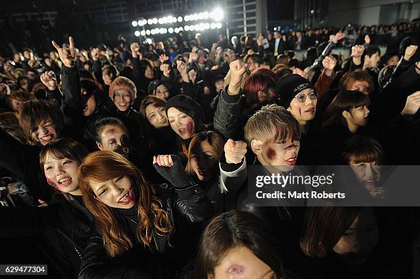 Fans dressed as Zombies attend the world premiere of 'Resident Evil: The Final Chapter' at the Roppongi Hills on December 13, 2016 in Tokyo, Japan.