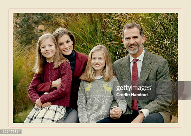 This handout picture provided by the Royal House Press department on December 13 shows the personal Christmas card of Their Majesties the King and...