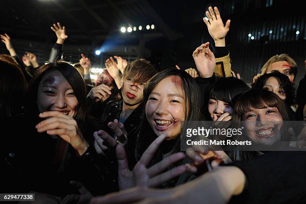 Fans dressed as Zombies attend the world premiere of 'Resident Evil: The Final Chapter' at the Roppongi Hills on December 13, 2016 in Tokyo, Japan.