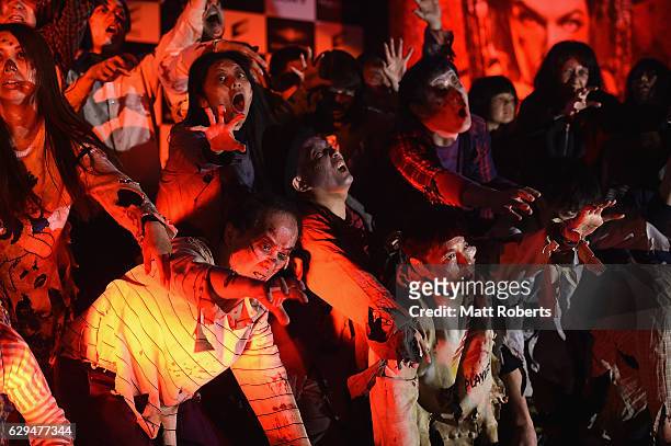 Zombies are seen on stage at the world premiere of 'Resident Evil: The Final Chapter' at the Roppongi Hills on December 13, 2016 in Tokyo, Japan.