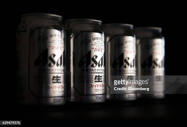 Cans of Asahi Breweries Ltd.'s Asahi Super Dry beer sit displayed for a photograph in Tokyo, Japan, on Tuesday, Dec. 13, 2016. Asahi agreed to buy...