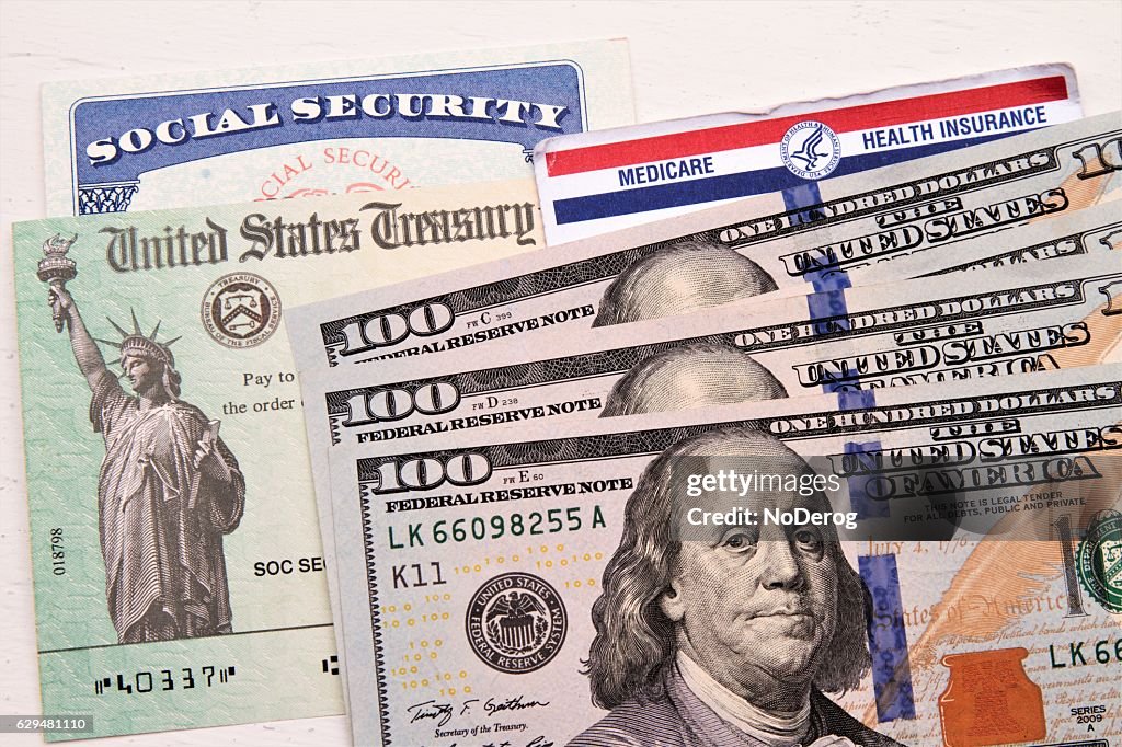 Social Security and Medicare cards, Treasury check, hundred dollar bills