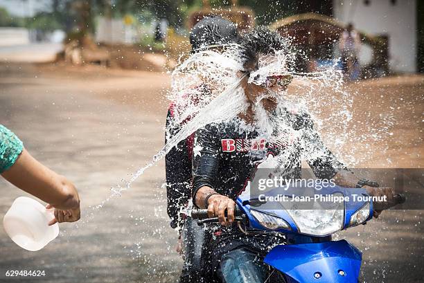 Splashed People Throwing Water Splash Photos and Premium High Res Pictures - Getty Images