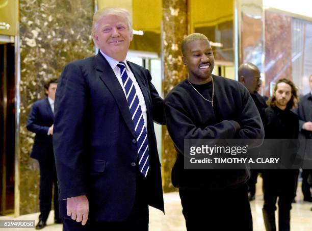Singer Kanye West and President-elect Donald Trump speak with the press after their meetings at Trump Tower December 13, 2016 in New York.