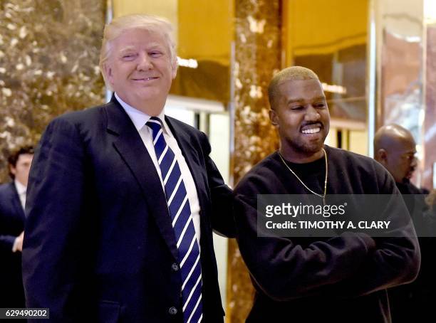Singer Kanye West and President-elect Donald Trump speak with the press after their meetings at Trump Tower December 13, 2016 in New York.
