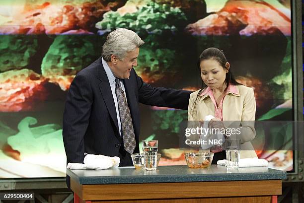 Episode 2836 -- Pictured: Host Jay Leno during a segment with America's top eater Sonya Thomas on December 14, 2004 --