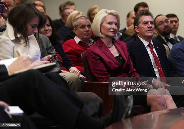 Former U.S. Sen. Jim DeMint , president of Heritage Foundation, and Callista Gingrich listen to her husband and former Speaker of the House Newt...