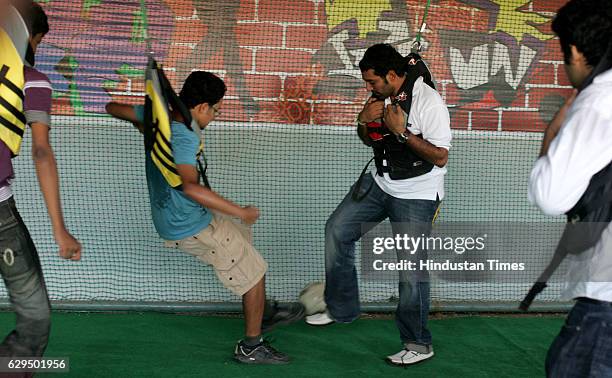 Cricketer Robin Uttappa takes part in a game of bungee soccer at the Chitrakoot grounds at andheri Mumbai