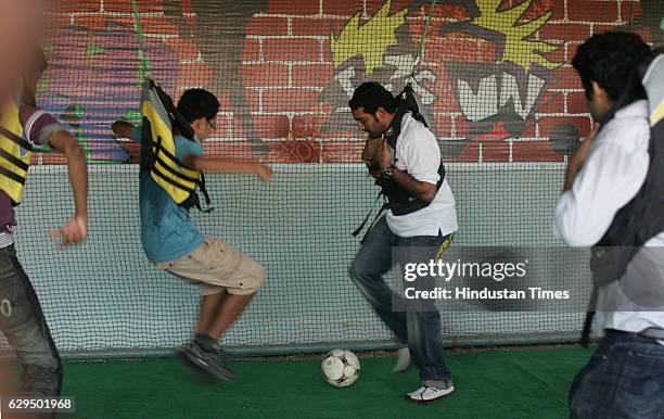 Cricketer Robin Uttappa takes part in a game of bungee soccer at the Chitrakoot grounds at andheri Mumbai