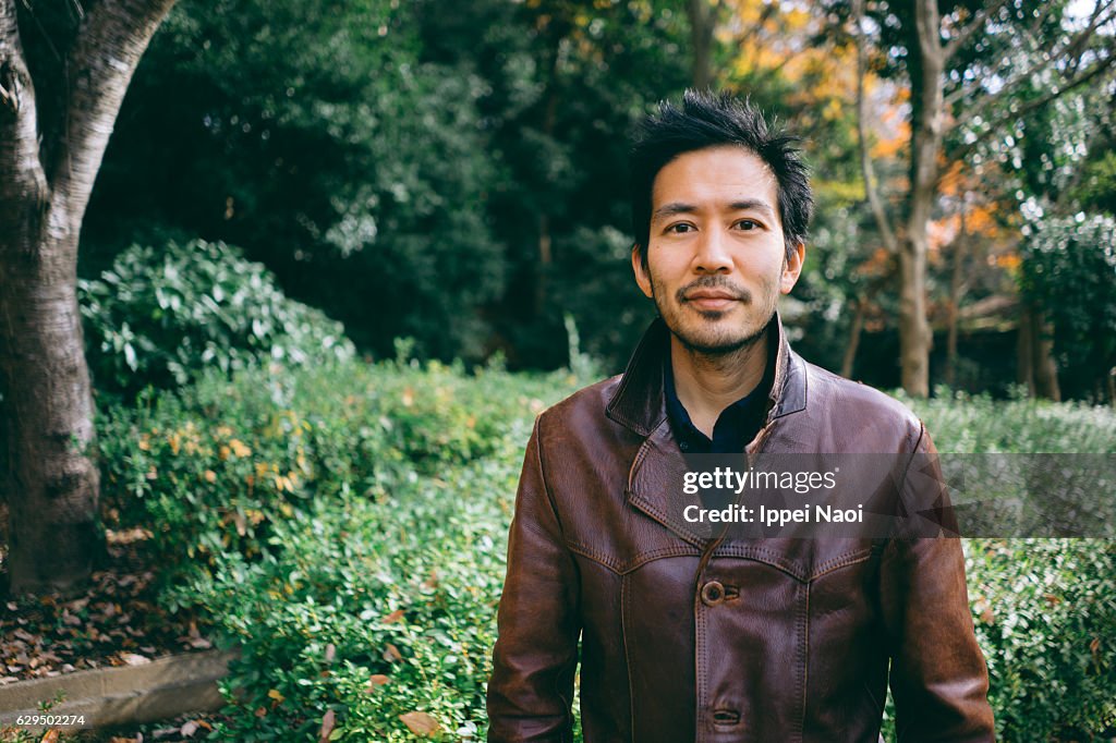 Portrait of Japanese man in leather jacket