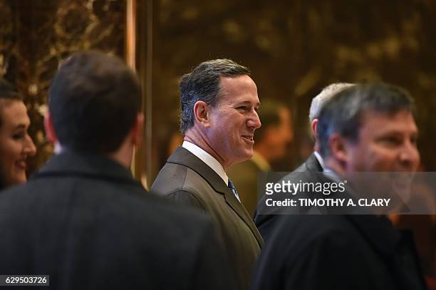 Rick Santorum arrives for meetings with US President-elect Donald Trump at Trump Tower in New York December 13, 2016. / AFP / TIMOTHY A. CLARY