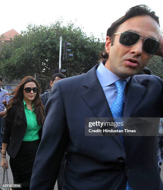 Co-owner of the Kings XI Punjab Preity Zinta & Ness Wadia come out of the High court after winning the case on the petition challenging termination...