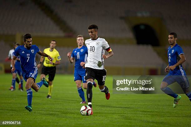 Timothy Tillman of Germany challenges Ori Zohar of Israel during the Under 18 International Friendly match between Israel and Germany on December 13,...