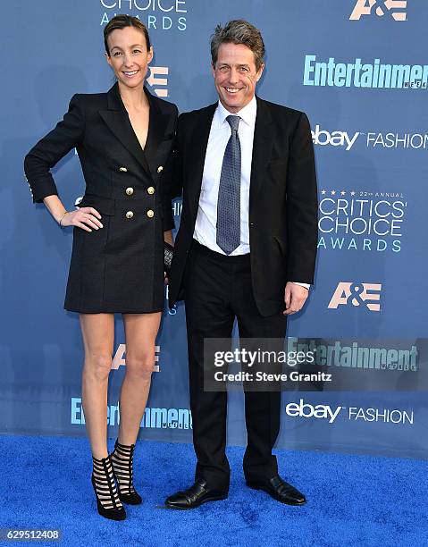 Hugh Grant, Anna Elisabet Eberstein arrives at the The 22nd Annual Critics' Choice Awards at Barker Hangar on December 11, 2016 in Santa Monica,...