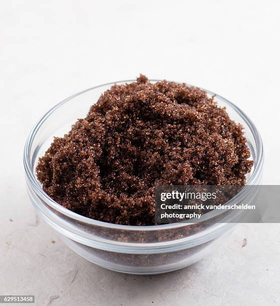 brown sugar in glass. - molasses stock pictures, royalty-free photos & images