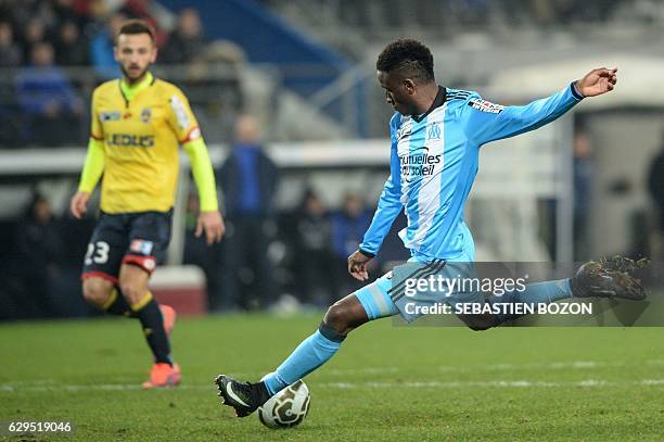 Olympique de Marseille's French forward Bouna Sarr scores during the French League Cup football match Sochaux vs Olympique de Marseille , on December...