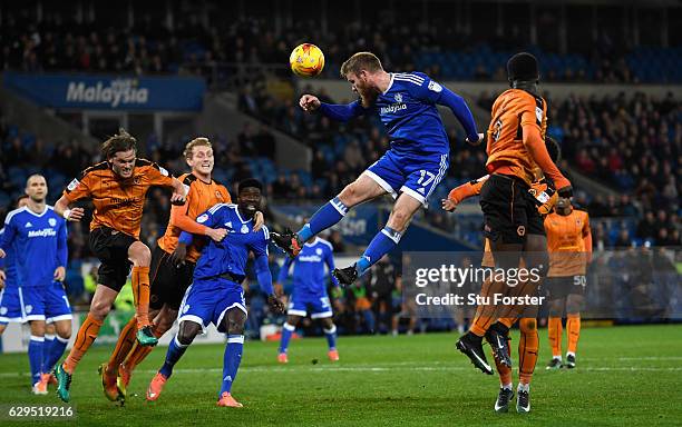 Cardiff player Aron Gunnarsson rises for a cross during the Sky Bet Championship match between Cardiff City and Wolverhampton Wanderers at Cardiff...