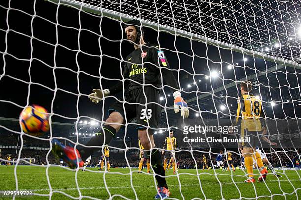 Dejected Petr Cech of Arsenal reacts after Seamus Coleman of Everton scores a goal to level the scores at 1-1 during the Premier League match between...