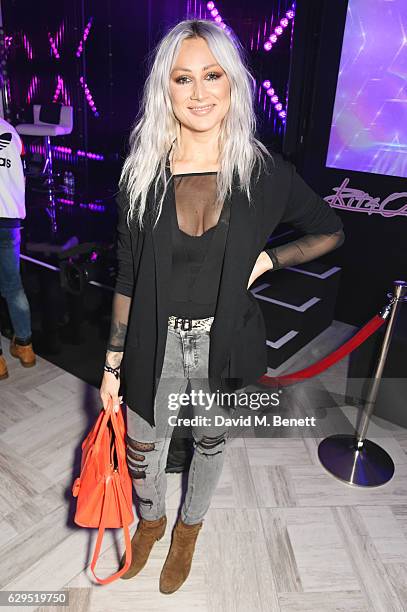 Lou Teasdale attends an intimate gig by Rita Ora at the newly relaunched Tezenis store at Oxford Circus crossing to celebrate Rita's recent lingerie...