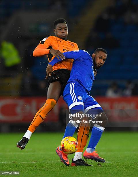 Wolves player Dominic Iorfa challenges Junior Hoilett of Cardiff during the Sky Bet Championship match between Cardiff City and Wolverhampton...