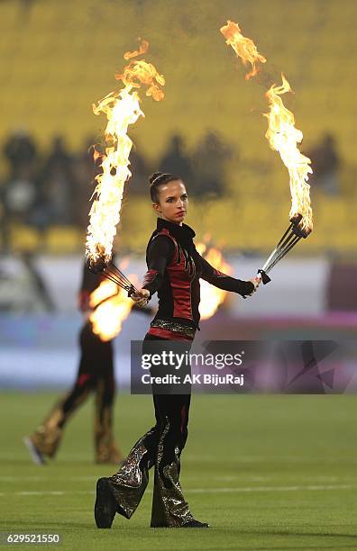 Performers show their skills before the Qatar Airways Cup match between FC Barcelona and Al-Ahli Saudi FC on December 13, 2016 in Doha, Qatar.