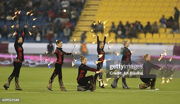 Performers show their skills before the Qatar Airways Cup match between FC Barcelona and Al-Ahli Saudi FC on December 13, 2016 in Doha, Qatar.