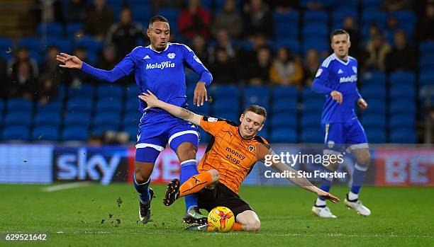 Cardiff player Kenneth Zohore challenges Jon Dadi Bodvarsson of Wolves during the Sky Bet Championship match between Cardiff City and Wolverhampton...
