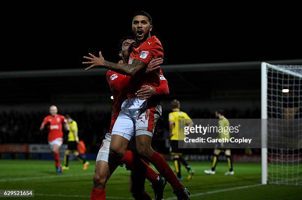 Nahki Wells of Huddersfield celebrates scoring the opening goal during the Sky Bet Championship match between Burton Albion and Huddersfield Town at...