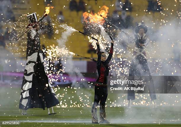 Performers show their skills before the Qatar Airways Cup match between FC Barcelona and Al-Ahli Saudi FC on December 13, 2016 in Doha, Qatar.