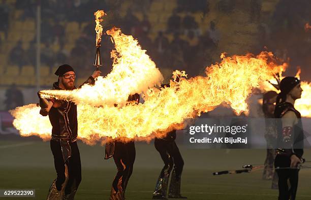 Performers show their skills before the Qatar Airways Cup match between FC Barcelona and Al-Ahli Saudi FC on December 13, 2016 in Doha, Qatar.