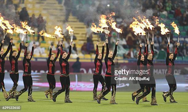 Performers show their skills before the Qatar Airways Cup match between FC Barcelona and Al-Ahli Saudi FC on December 13, 2016 in Doha, Qatar.