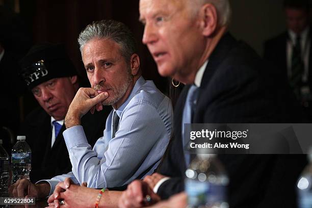 Vice President Joseph Biden speaks during a roundtable on the Cancer Moonshot Initiative as comedian Jon Stewart looks on December 13, 2016 at...