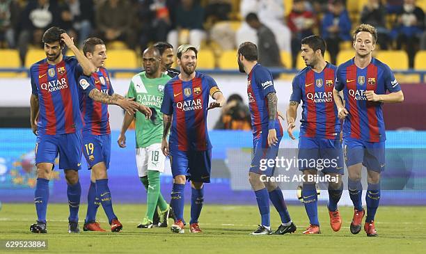 Lionel Messi of Barcelona celebrates scoring a goal against Al-Ahli Saudi FC during the Qatar Airways Cup match between FC Barcelona and Al-Ahli...