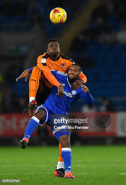 Wolves player Dominic Iorfa challenges Junior Hoilett of Cardiff during the Sky Bet Championship match between Cardiff City and Wolverhampton...