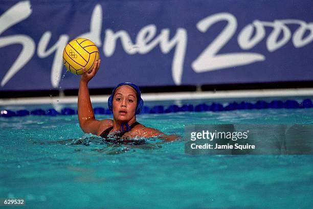 Branda Villa of the USA gets ready to pass the ball during the Women's Water Polo Game against the Netherlands at the Ryde Aquatic Leisure Centre for...
