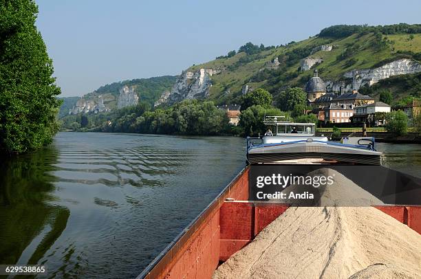 Barge loaded with sand and bits of gravel, Eric Pluquet's Bismarck, bargee / bargeman, in the Vallee de Seine in Les Andelys . River transport .